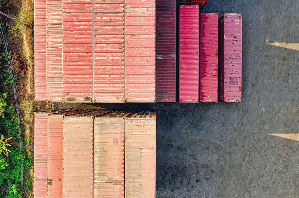 Aerial grid of stacked shipping containers