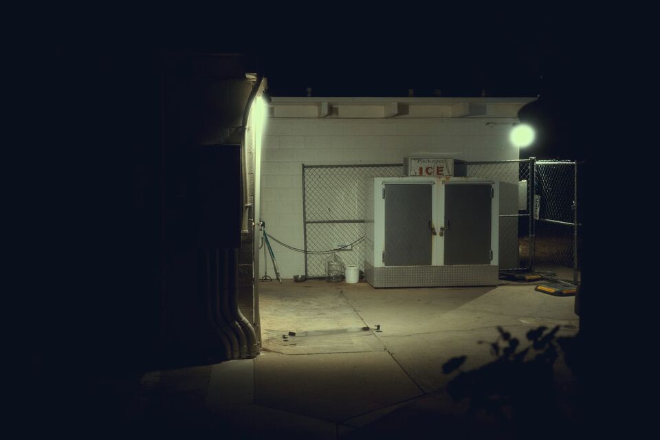 Industrial facility exterior at night