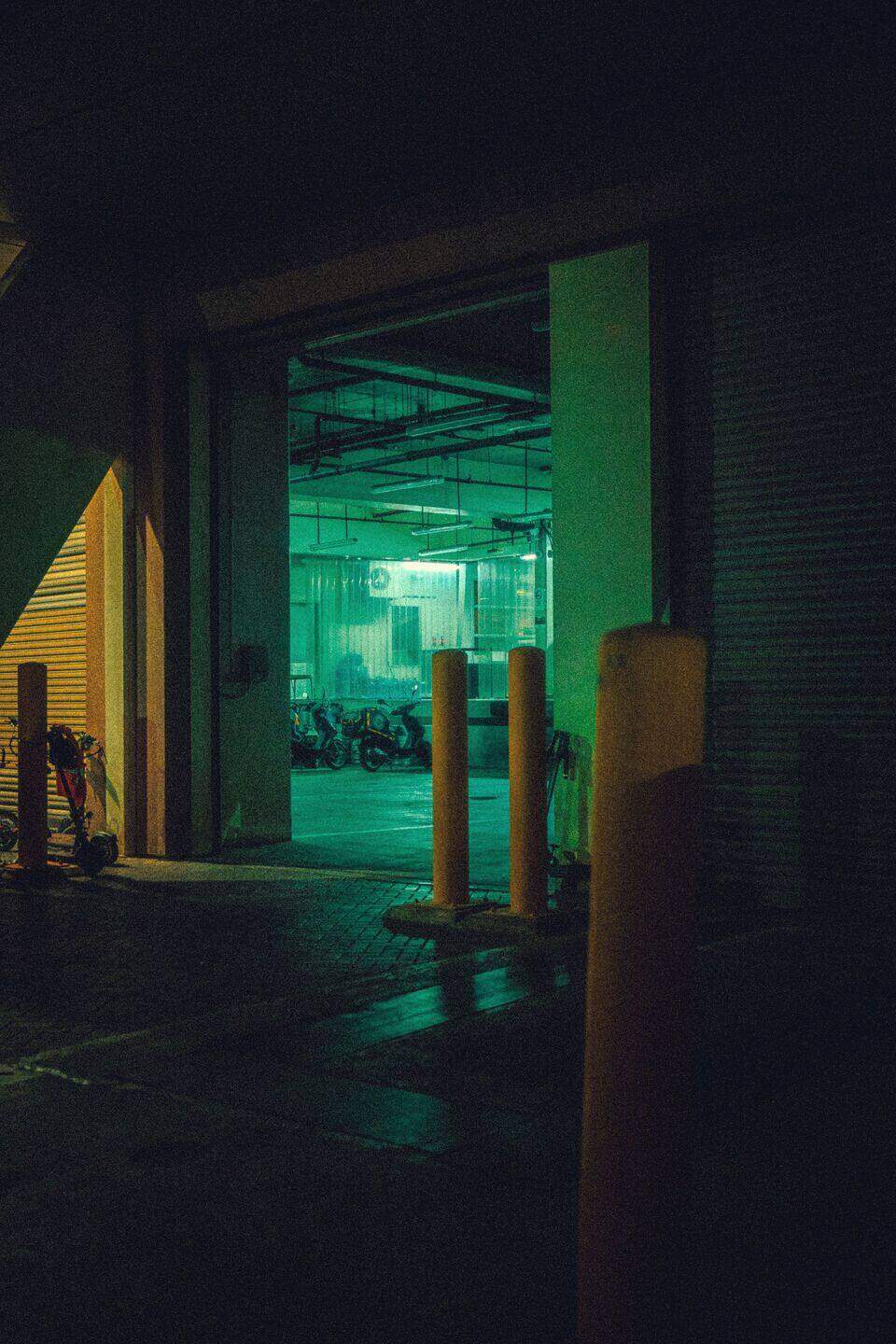 Loading bay lit by sodium lamps at night