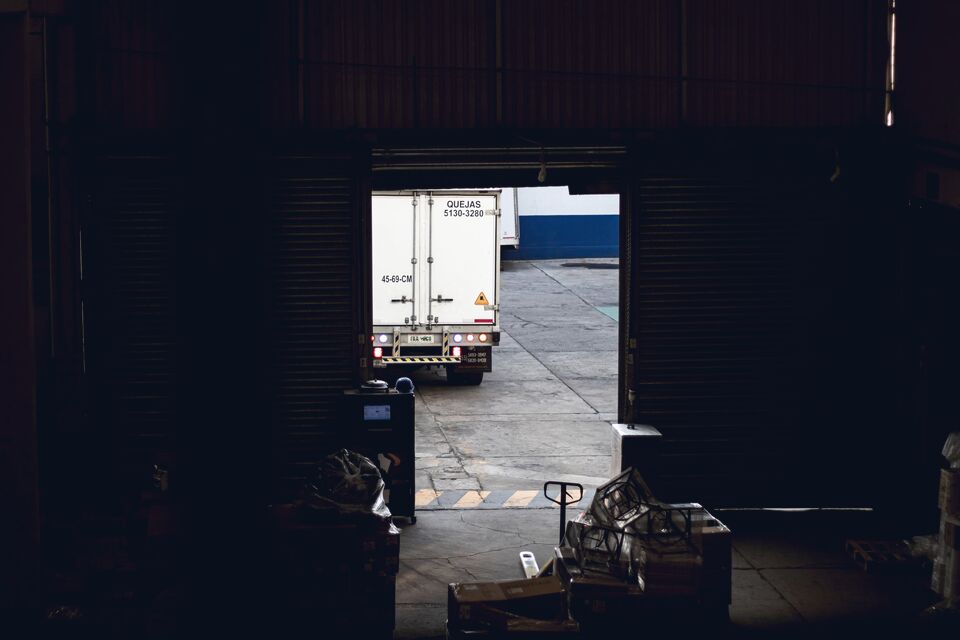 Truck pulling away from a loading dock
