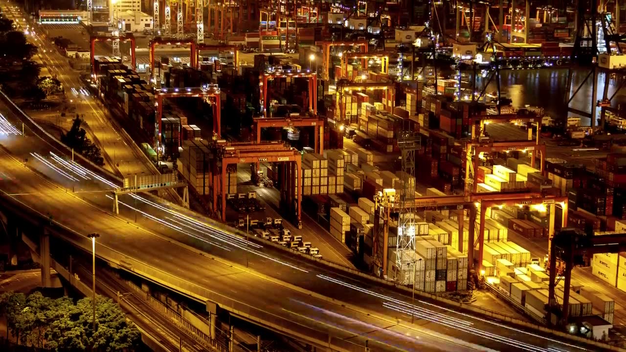Container yard under lights at night